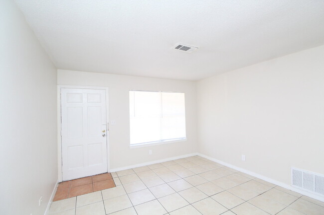 Building Photo - Affordable 2BR Duplex Near UWF — All Tile,...