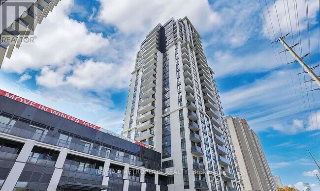 Building Photo - 202-18202 Burnhamthorpe Rd E