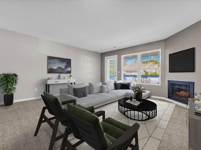 Una acogedora chimenea añade calidez y ambiente, mientras que los cómodos asientos y la decoración contemporánea crean una atmósfera relajada pero elegante. - Wyndham Hill