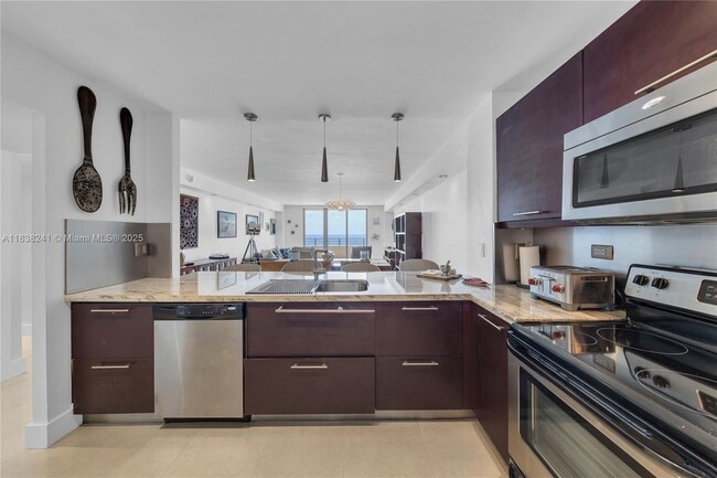 Building Photo - 5555 Collins Ave