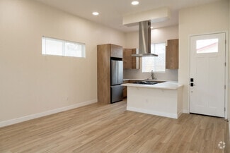 View of kitchen and front door - 4772 Bancroft St