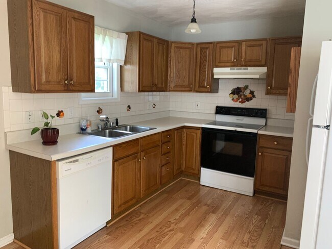 Photo - House with Long Driveway & Front Porch