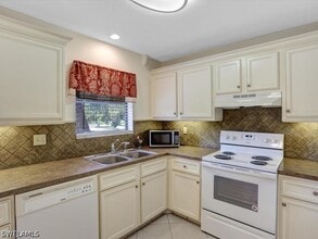 Building Photo - 4912 Tamiami Trl E