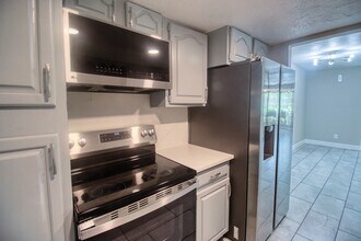 Building Photo - 6393 S Briar Bayou Dr