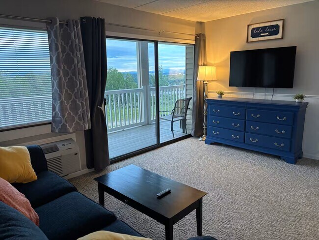 Building Photo - Cedar Lodge 201