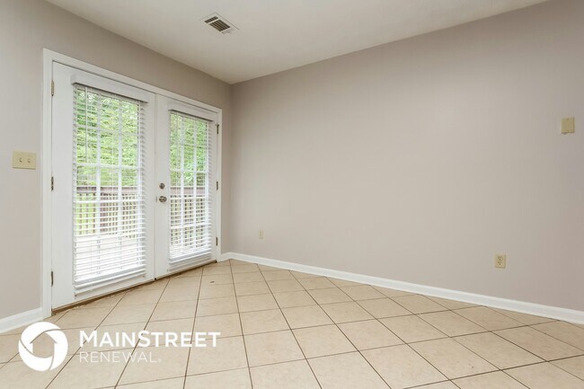 Building Photo - 8560 Glenwoods Dr