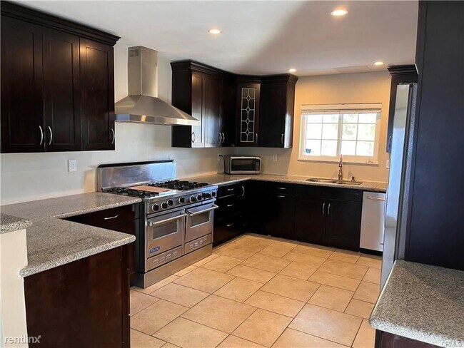Foto del edificio - 4 br, 3 bath House - 11447 Brainard Ave