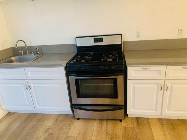 Stove as incentive - 11622 S Hoover St