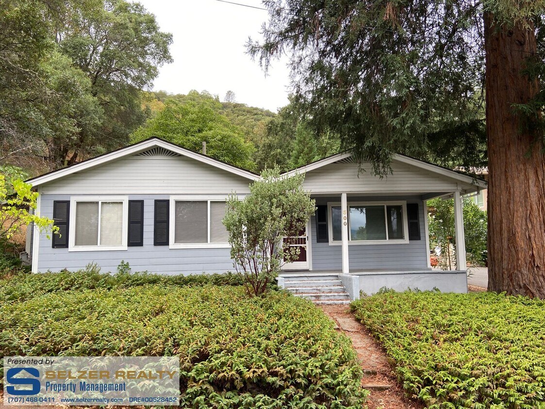Primary Photo - Charming 2 bd. bungalow set against the we...