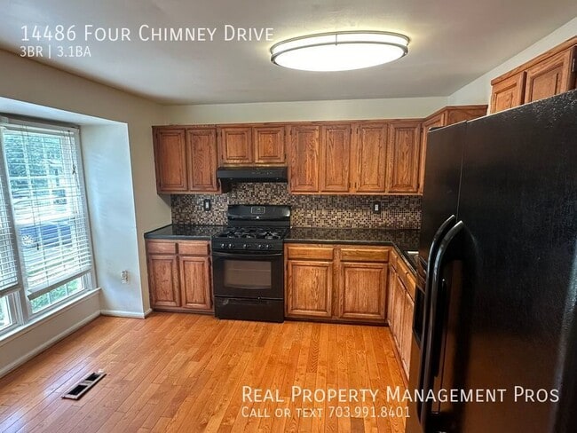 Foto del edificio - 14486 Four Chimney Dr