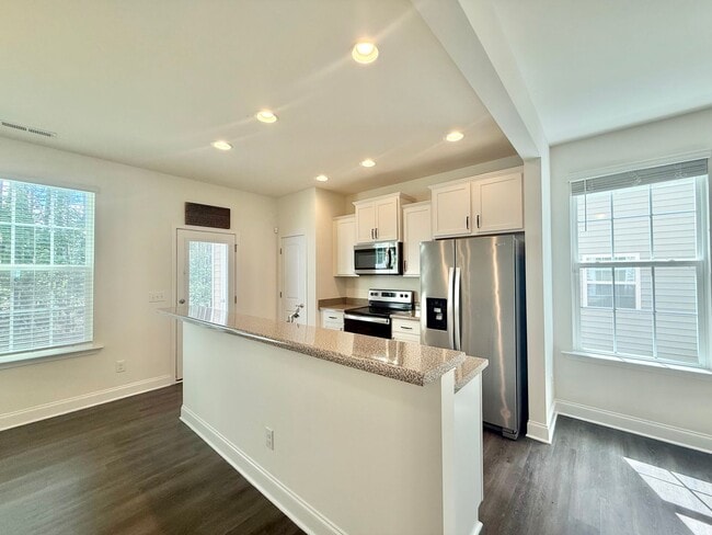 Building Photo - Spacious 3BD, 2.5BA End Unit Raleigh Townhome Near White Oak Shopping Center, I-40, and Downtown ...
