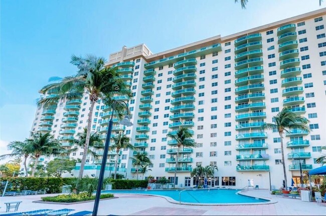 Building Photo - 19370 Collins Ave
