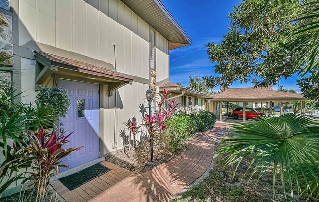 Front Door with Adjacent & Storage ClosetCarport - 4267 Island Cir