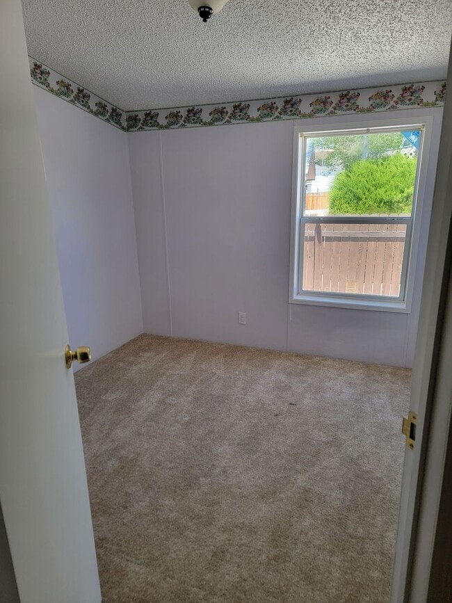 Foto del edificio - Bright 3-Bed, 2-Bath Home with Yard in 55+ Community!