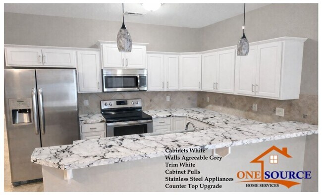 Foto del edificio - Renovated 3BR Townhome with Modern Finishes
