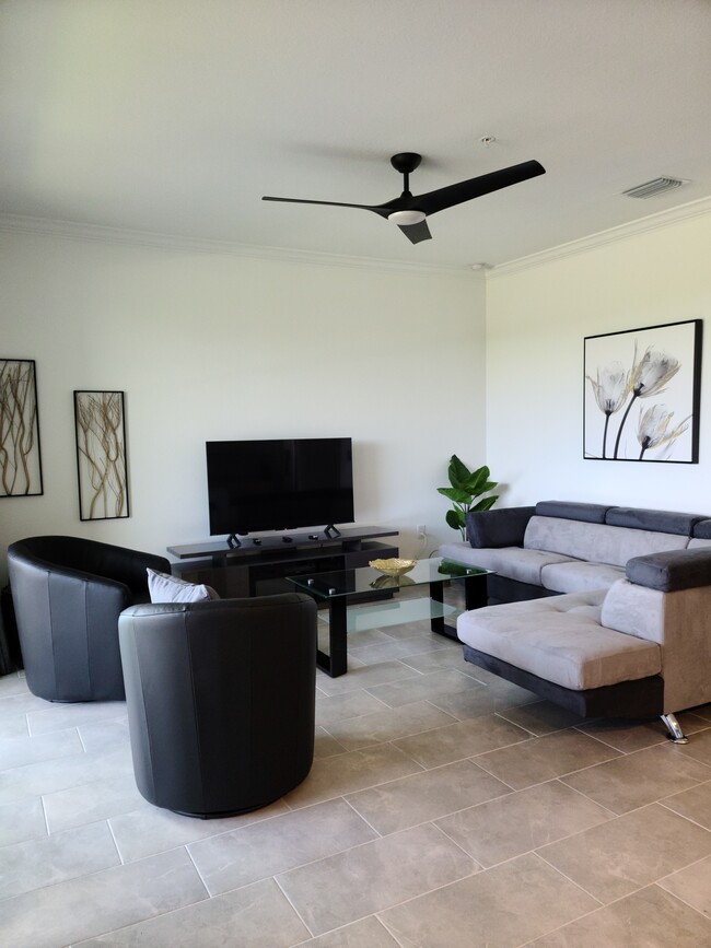 Living Room w/TV and Electric Fireplace - 18028 Gawthrop Dr