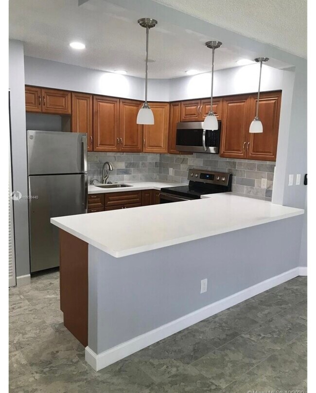 View of Kitche from Living Room - 3049 NE 20th Ter