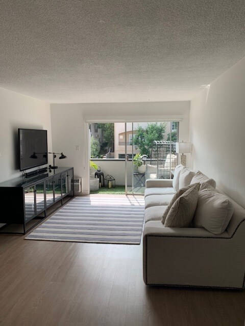 Living Room leading to front balcony - 1700 Malcolm Ave