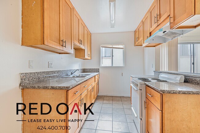 Building Photo - ~1 Month FREE~ Serene Two Bedroom with a P...