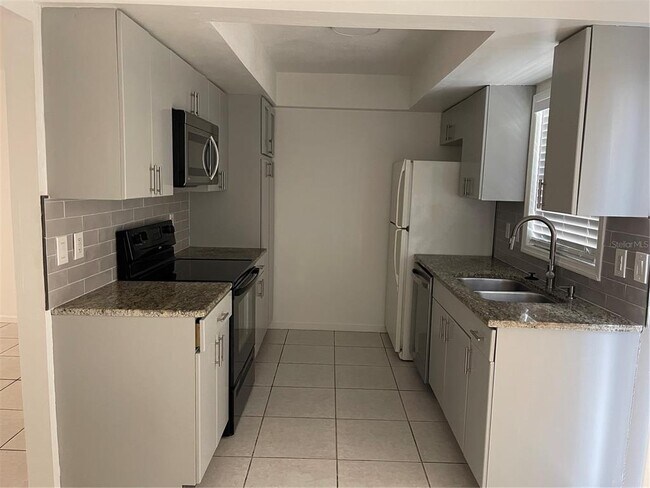 Foto del edificio - 7437 Belle River Ct
