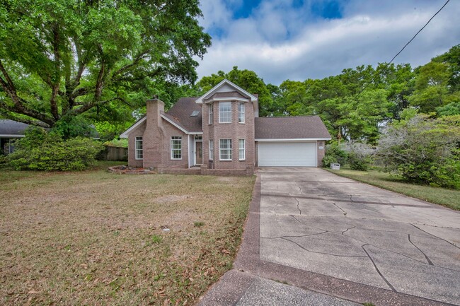 Building Photo - Spacious 3BR Retreat with Soaring Ceilings & Screened Porch