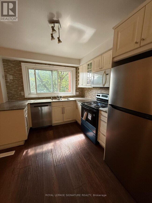 Photo du bâtiment - 4230 Fieldgate Dr