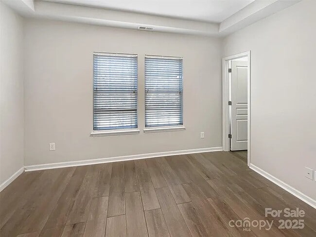 Lvp flooring, small walk in closet in the corner. - 13811 Waverton Ln
