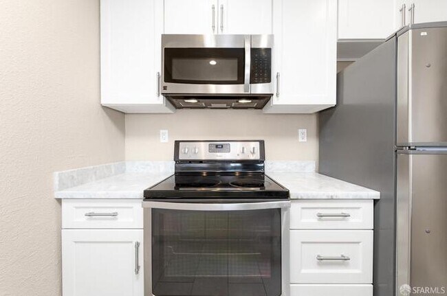 Building Photo - "Charming 1-Bed, 1-Bath Condo at 13700 San...