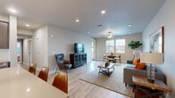 Located at 511 Carlson Ave in Rohnert Park, CA, this well-appointed single-floor home offers three bedrooms and three bathrooms across a thoughtfully designed layout. The open-concept living and dining area serves as the heart of the home, featuring light hardwood-style flooring, recessed lighting, and a ceiling fan. Large windows invite abundant natural light and provide outdoor views, while the space comfortably accommodates both a seating area and a dining nook. The kitchen is outfitted with rich wood-toned cabinetry, light countertops, a subway tile backsplash, and stainless steel appliances, including a side-by-side refrigerator and built-in microwave. The primary bedroom is generously sized, complete with plush carpet flooring, dual windows, a ceiling fan, and access to a dedicated walk-in closet featuring dual hanging rods and shelving. Additional bedrooms are equally well-proportioned with carpet flooring, ceiling fans, and natural light. The bathrooms feature clean, modern finishes with wood-toned vanities, light countertops, and tub-shower combinations with white tile surrounds. One bathroom includes luxury vinyl plank flooring, adding a contemporary touch. Overall, the home presents a clean, modern aesthetic throughout.
