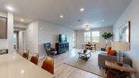 Located at 511 Carlson Ave in Rohnert Park, CA, this well-appointed single-floor home offers three bedrooms and three bathrooms across a thoughtfully designed layout. The open-concept living and dining area serves as the heart of the home, featuring light hardwood-style flooring, recessed lighting, and a ceiling fan. Large windows invite abundant natural light and provide outdoor views, while the space comfortably accommodates both a seating area and a dining nook. The kitchen is outfitted with rich wood-toned cabinetry, light countertops, a subway tile backsplash, and stainless steel appliances, including a side-by-side refrigerator and built-in microwave. The primary bedroom is generously sized, complete with plush carpet flooring, dual windows, a ceiling fan, and access to a dedicated walk-in closet featuring dual hanging rods and shelving. Additional bedrooms are equally well-proportioned with carpet flooring, ceiling fans, and natural light. The bathrooms feature clean, modern finishes with wood-toned vanities, light countertops, and tub-shower combinations with white tile surrounds. One bathroom includes luxury vinyl plank flooring, adding a contemporary touch. Overall, the home presents a clean, modern aesthetic throughout.