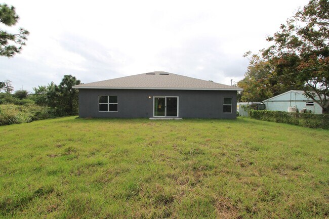 Building Photo - BEAUTIFUL 4 Br/2 Ba Home in Palm Bay!