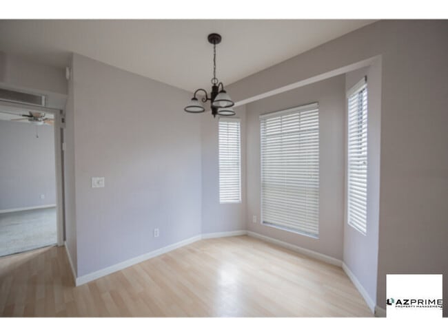 Building Photo - Live elevated in this premium upper-level ...