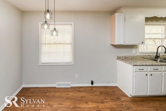 Building Photo - Lease today! No extra charge for contentme...