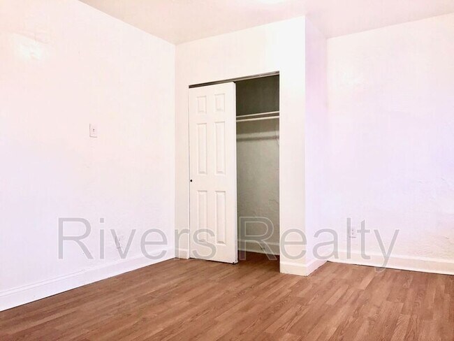 Building Photo - 5001 Tholozan Ave