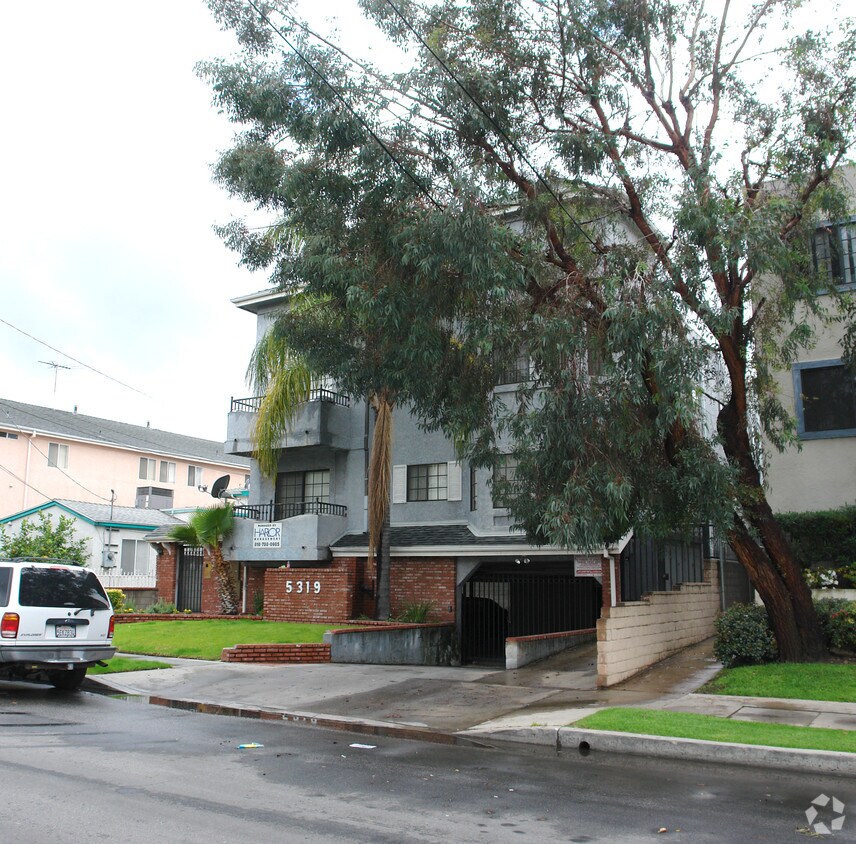 tree obstruction, limited view. No rear or side view. - 5319 Cartwright Ave
