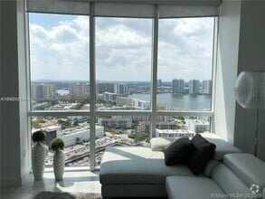 Building Photo - 18201 Collins Ave