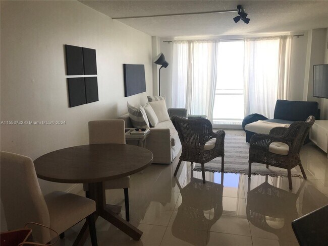 Building Photo - 6917 Collins Ave