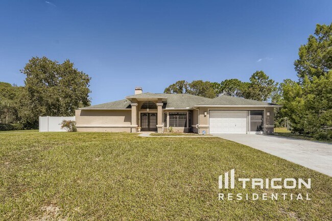 Building Photo - 11327 Rainbow Woods Loop