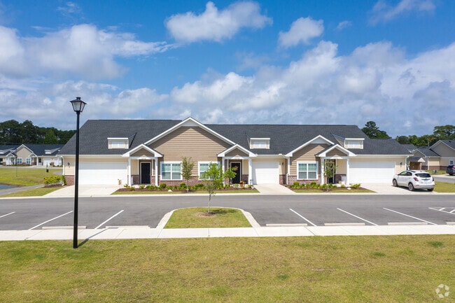 Building Photo - River Oaks Villas