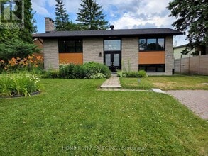 Building Photo - 1022 Wiseman Crescent
