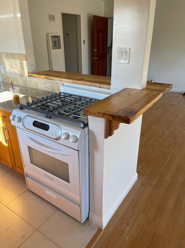 Custom Appliances/Wood Maple Stained Bar Counters - 3657 Mentone Ave