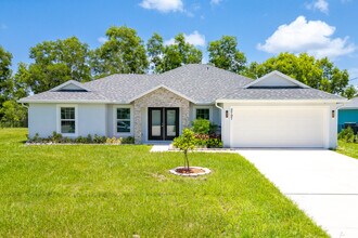 Building Photo - 5797 NW Coosa Dr