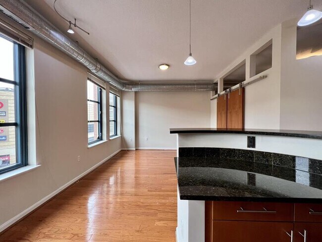 Building Photo - 1390 Kenyon St NW