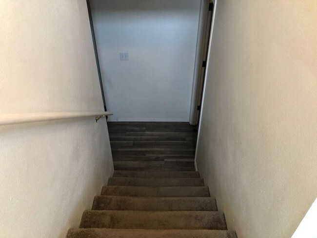 Building Photo - TWO BEDROOM TOWN HOME STYLE WITH GARAGE