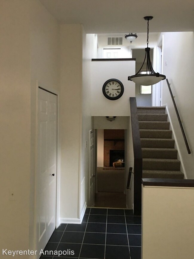 Downstairs features large family room, fireplace, and office. - 1385 Stonecreek Rd