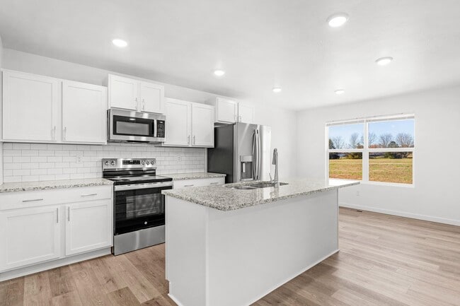 Building Photo - Nearly NEW home in Willard!