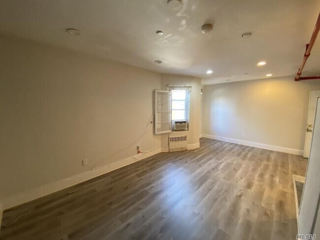 Building Photo - 32-50-50 104th St