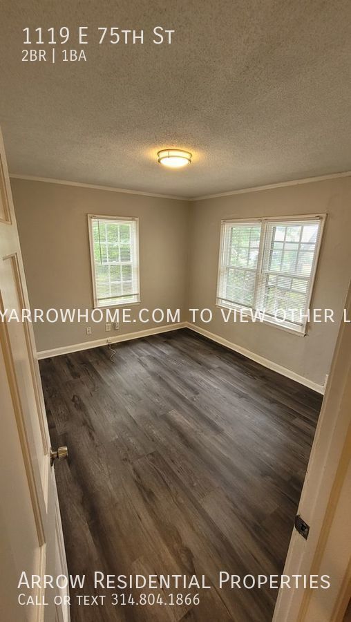 Building Photo - 1119 E 75th St. | 2Bdrm 1 Bath $1100