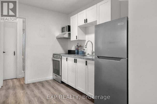 Building Photo - 4595 Queen St