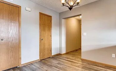 Hard surface floors throughout the main level - 5505 Orleans Ln N